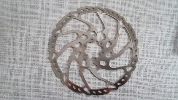 Eine gebrauchte Shimano Bremsscheibe 203 mm